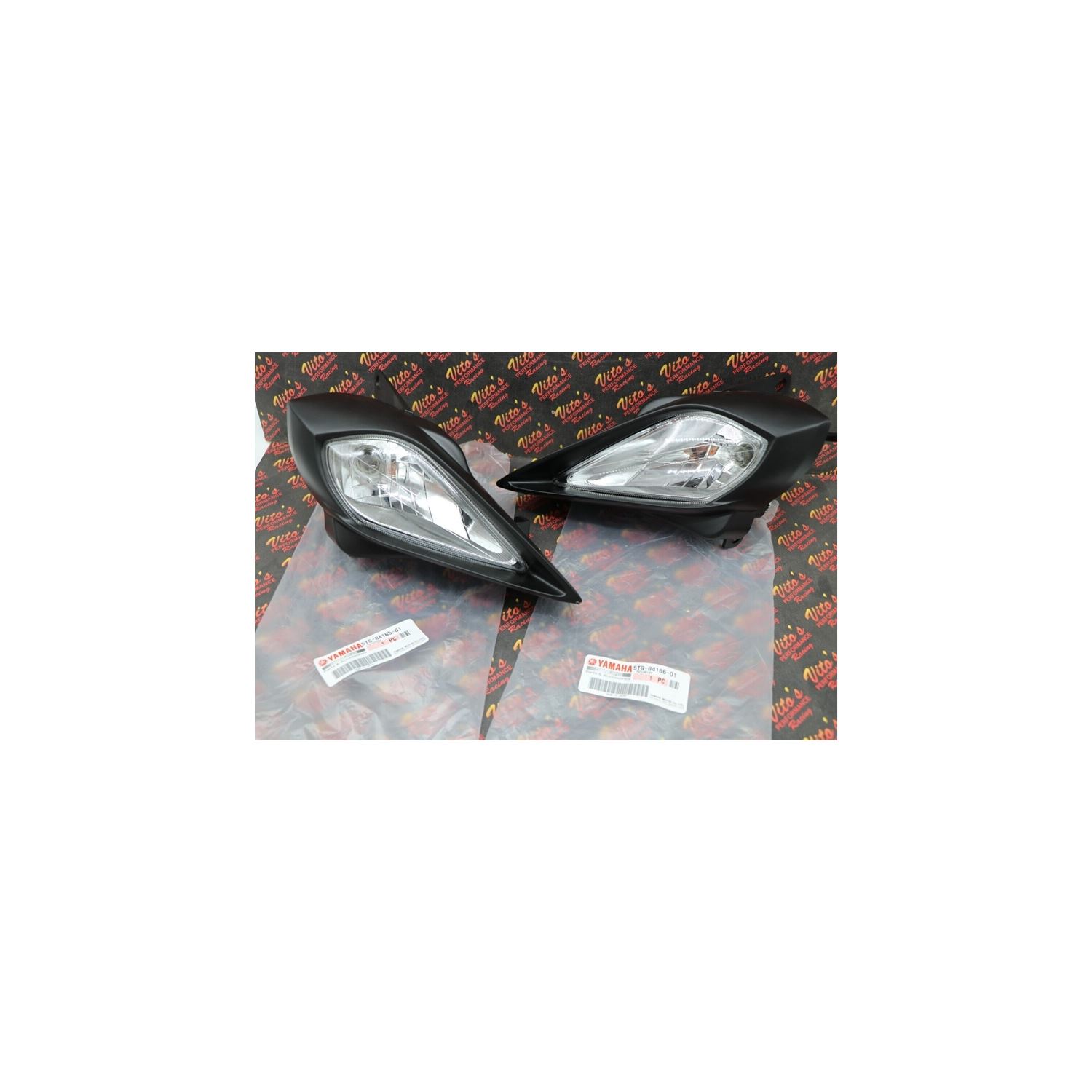 2 x Headlights + bulbs + plastic surround + socket